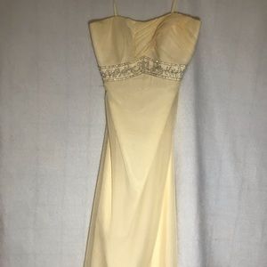 Lemon yellow pastel color long dress.